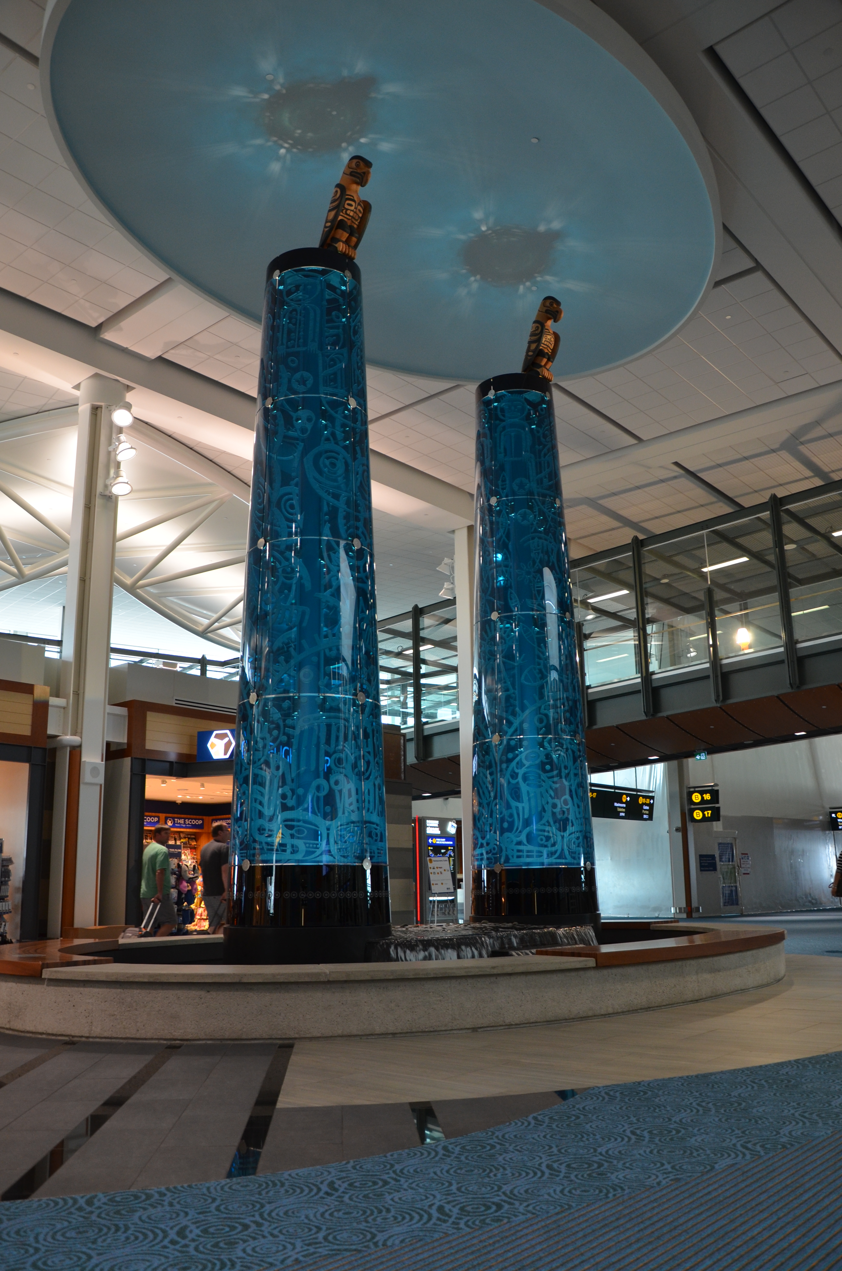 Charles Gabriel_Glassworks_ for artist, Marianne Nicolson_Rivers Monument_Completed bent, tapered, colored, laminated, sculpted, lighted, art glass sculptures installed onsite at YVR International Airport, Vancouver BC_ 2014 A