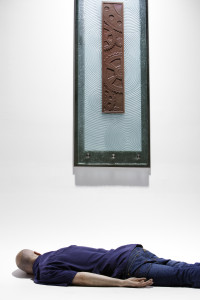 Charles Gabriel_Sculptural Glass_hand-carved and kiln-fired art glass_Chocolate_carved, fired and fritworked gear images_wall mounted onto stainless panel