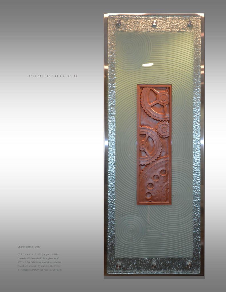 Gear shapes carved into glass using sandblaster for Art Glass wall sculpture titled: "Chocolate 2.0" Victoria BC